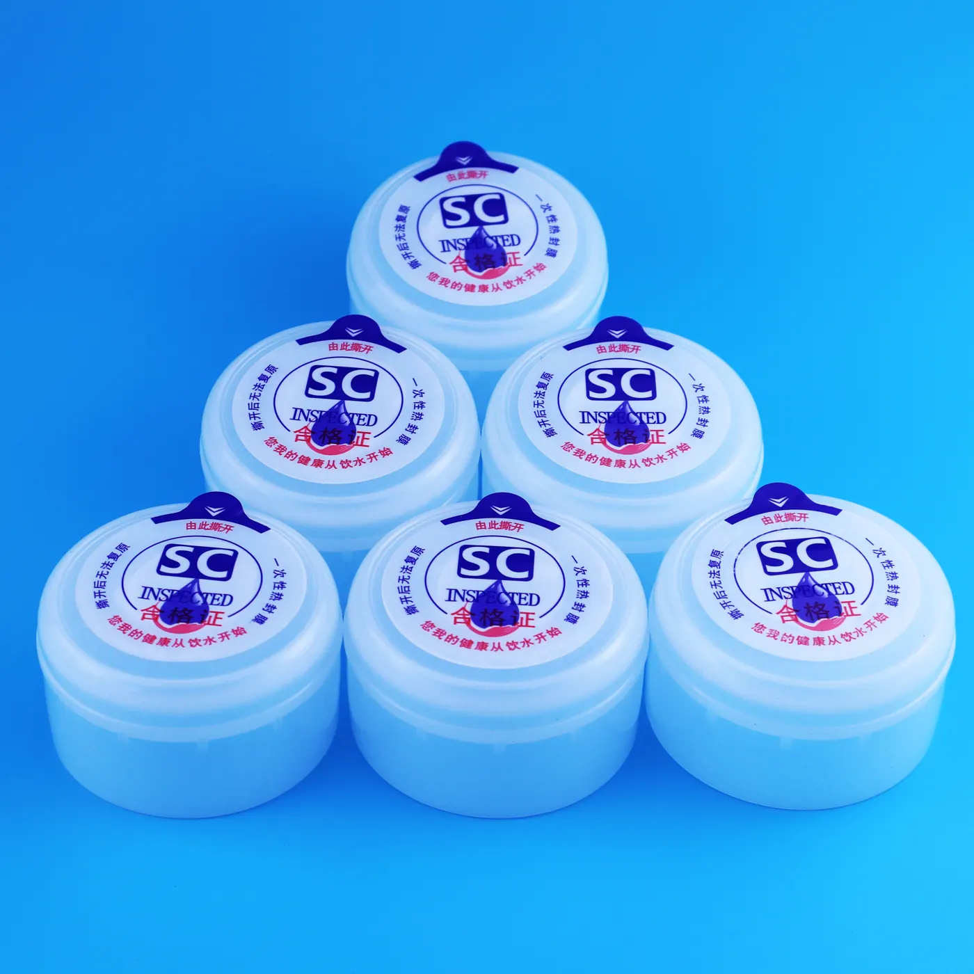 Photo of one time use 5 gallon water bottle cap assortment